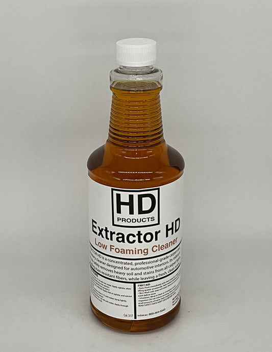32oz Bottle of HD Extractor HD cleaning solution on a gray background
