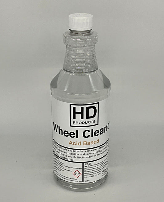 32oz Bottle of HD Products wheel cleaner on a gray background