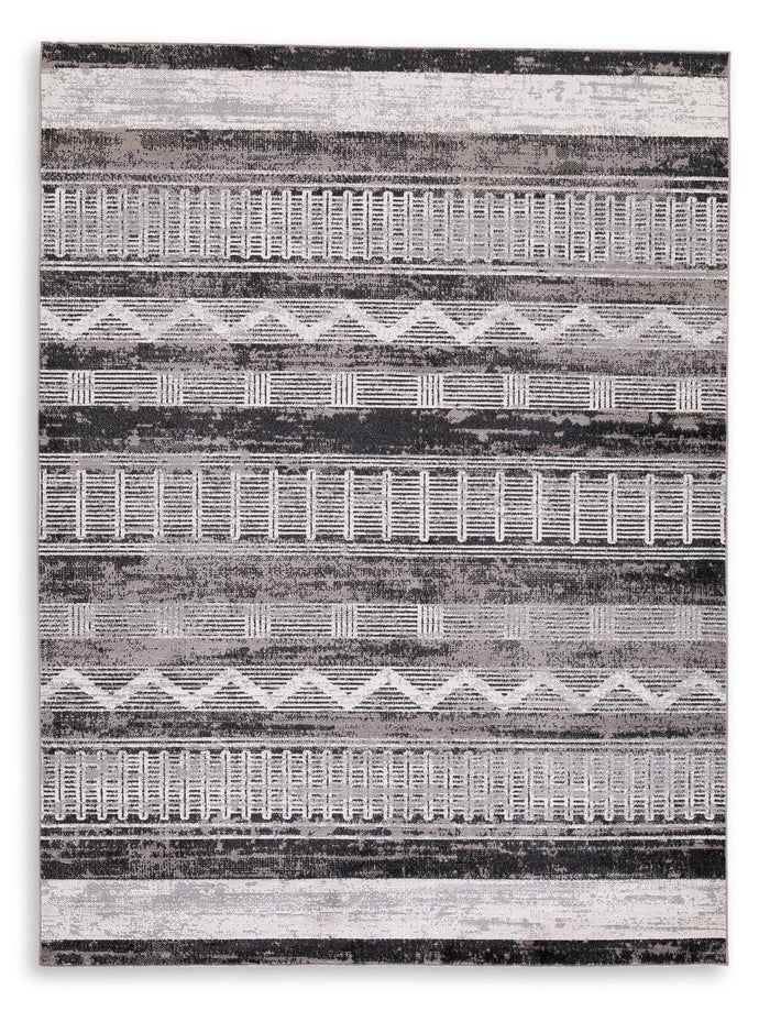 Gray and white geometric striped area rug with horizontal bands and distressed texture