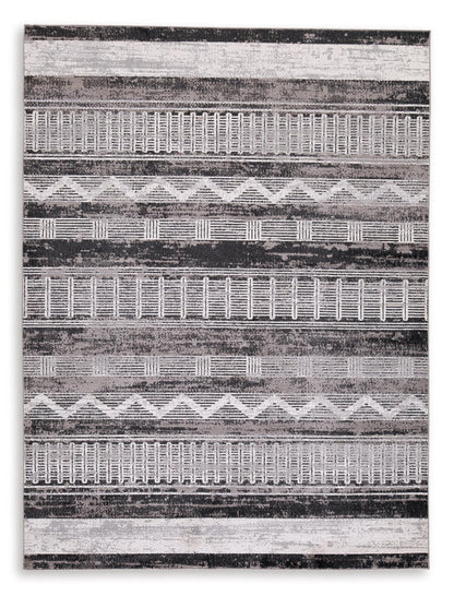 Gray and white geometric striped area rug with horizontal bands and distressed texture