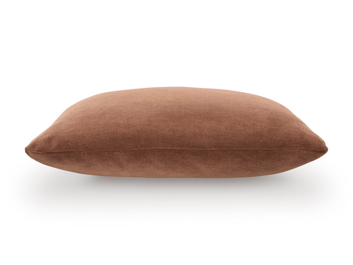 Camel tan square throw pillow, side view showing a low-profile shape.