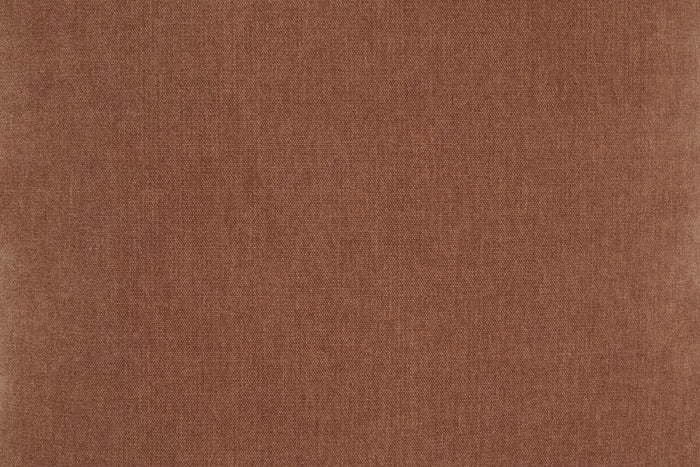 Sienna brown woven pillow fabric texture close-up.