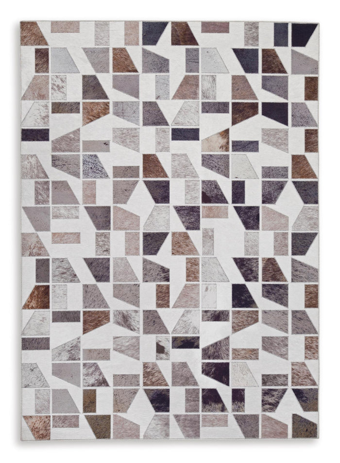 Geometric area rug with multicolor block pattern in gray, brown, black on white
