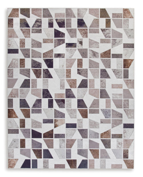 Geometric area rug with white, gray, brown, and dark purple square-and-block design