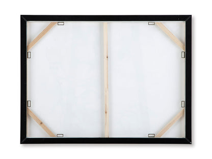 Back view of framed wall art with wooden stretchers and metal corner fasteners