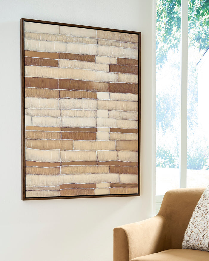 Framed wall art with layered horizontal brick stripes in beige, white, and brown