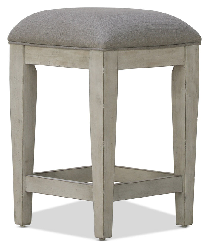 Backless stool in gray with light wood legs and lower footrest