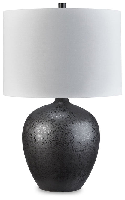 Table lamp with white drum shade and dark speckled ceramic base