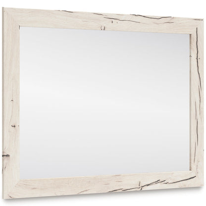 Rectangular bedroom wall mirror with distressed pale wood frame and clear glass