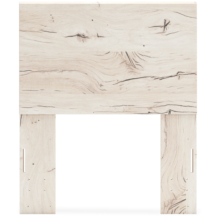 Whitewashed light-wood panel headboard, wide front view with side leg cutouts