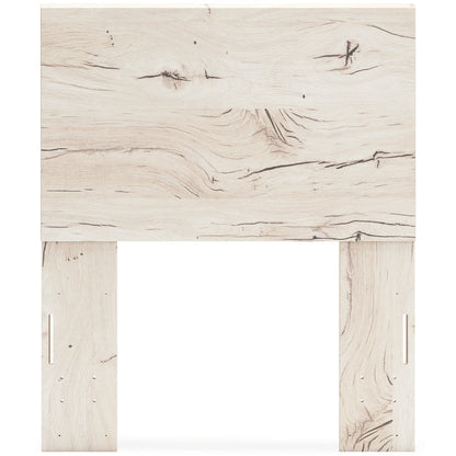Whitewashed light-wood panel headboard, wide front view with side leg cutouts
