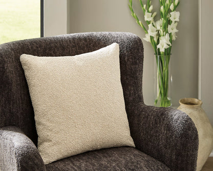 Square throw pillow in light tan textured fabric
