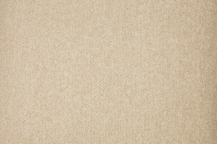 Close-up of light tan textured throw pillow fabric