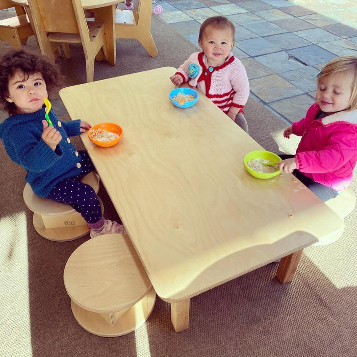 Children sitting on Magda Stools