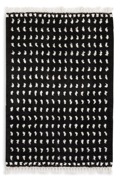 5 x 7 ft black rug with white geometric dash pattern and short fringed edges