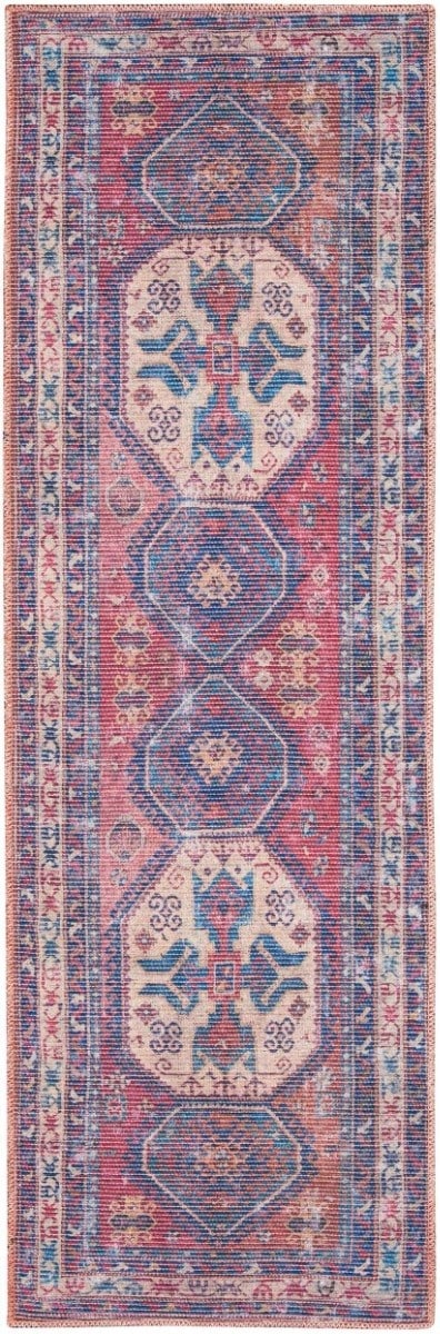 Washable area rug with red, blue, and cream geometric medallion pattern.