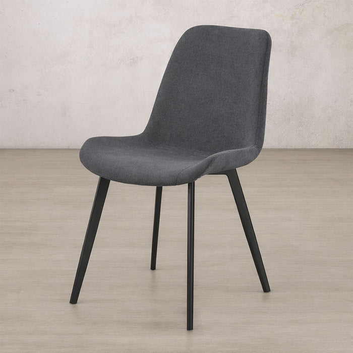 Angle view of the Nora fabric dining chair in Storm Grey | dining chairs, dining chairs for sale, fabric dining chair, dining chairs for round table