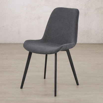 Angle view of the Nora fabric dining chair in Storm Grey | dining chairs, dining chairs for sale, fabric dining chair, dining chairs for round table