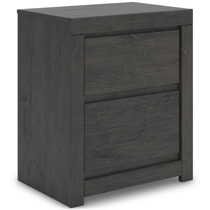 Dark gray nightstand with two stacked drawers, side view