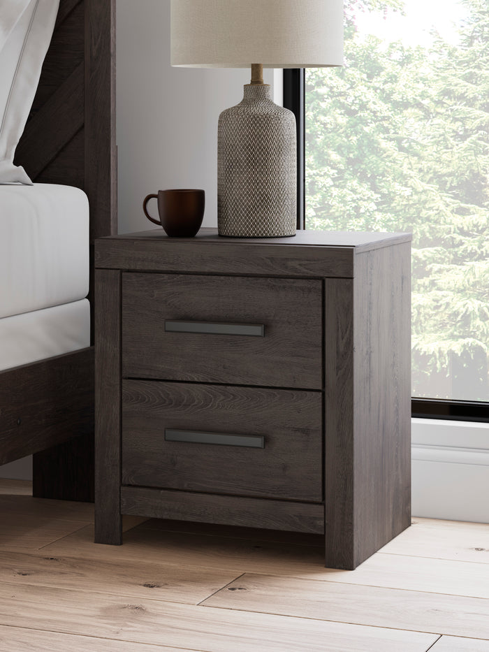 Dark wood nightstand with two drawers and horizontal bar pulls