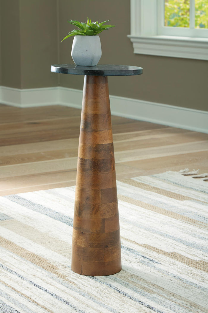 Quinndon accent table with round dark tabletop on slender tapered wood pedestal