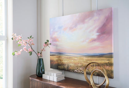 Landscape canvas wall art with pastel clouds and golden field, black-stretched frame