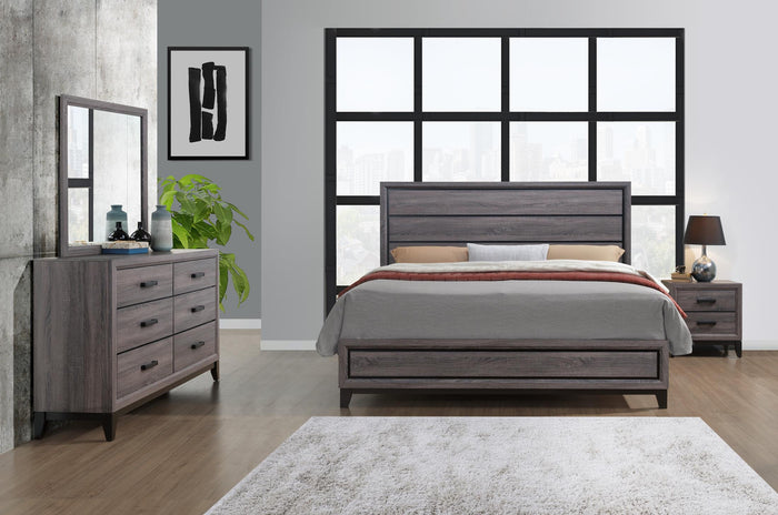 Bedroom wall mirror above gray dresser with multiple drawers