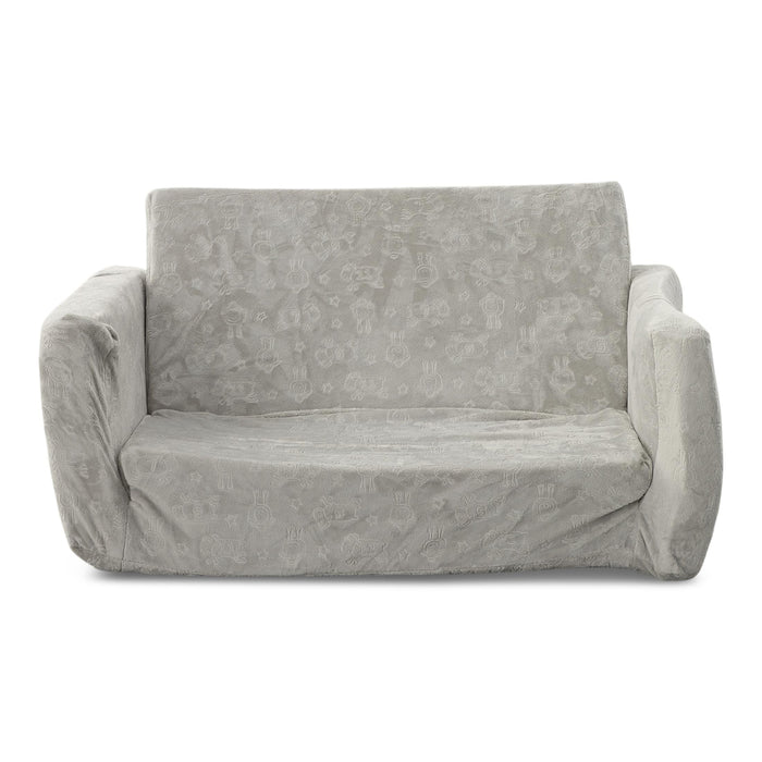 Gray patterned convertible sofa with rounded arms and boxy backrest