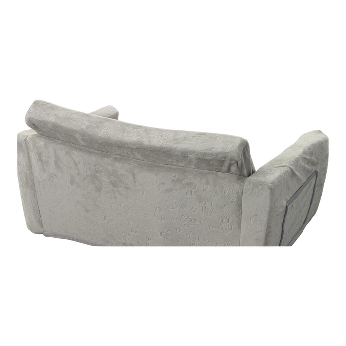 Gray patterned convertible sofa with backrest folded down for sleeping position