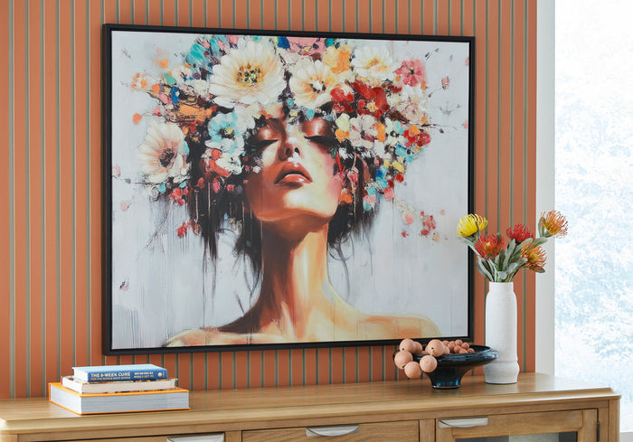 Framed wall art: abstract woman face with colorful floral elements, black frame