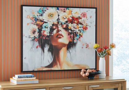 Framed wall art: abstract woman face with colorful floral elements, black frame