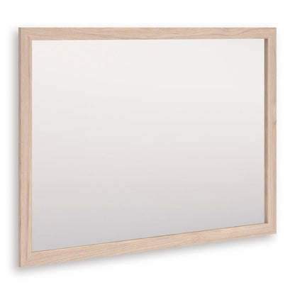 Rectangular wall mirror with light-wood frame and beveled outer edge