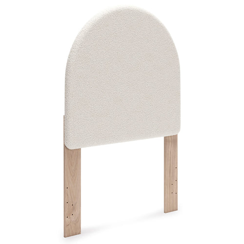 Upholstered headboard side profile, rounded top, light beige fabric and wooden legs
