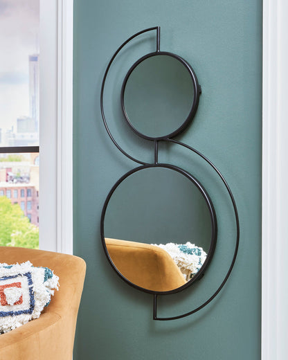 Decorative accent mirror with two overlapping circles and dark metal frames