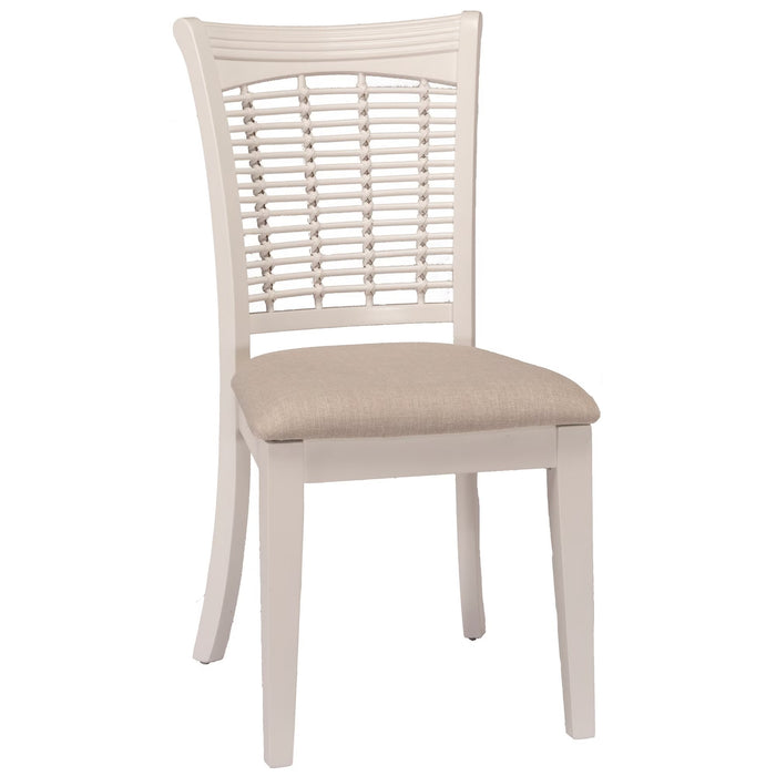 A single dining chair with a white frame, a woven slat backrest, and a light beige upholstered seat cushion, shown against a plain white background.