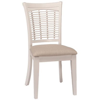 A single dining chair with a white frame, a woven slat backrest, and a light beige upholstered seat cushion, shown against a plain white background.