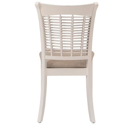 White chair with woven backrest on a white background