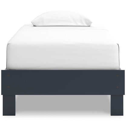 Platform bed with dark blue footboard and legs, showing white mattress