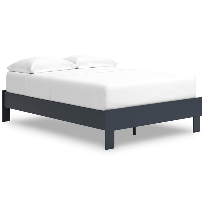 White upholstered platform bed with dark blue frame and corner support legs