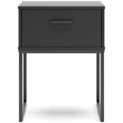 Black nightstand with one drawer and metal bar pull, raised on four legs.