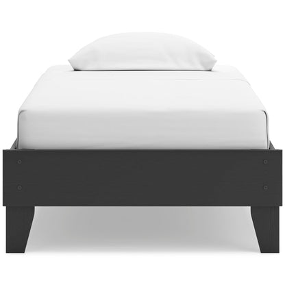 Socalle platform bed front view with black headboard and white upholstered mattress