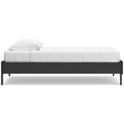 Socalle platform bed side view with dark frame, white mattress, and pillow