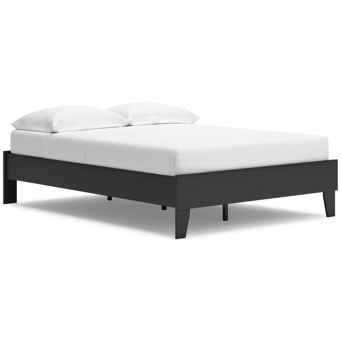 Socalle platform bed angled view with black frame and white mattress and pillows