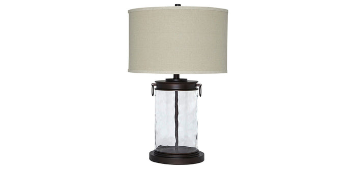 Table lamp with light beige fabric shade and black glass base