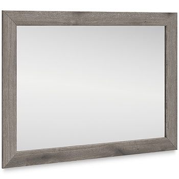 Urbanoore bedroom mirror with gray wood-grain frame and beveled edges, angled