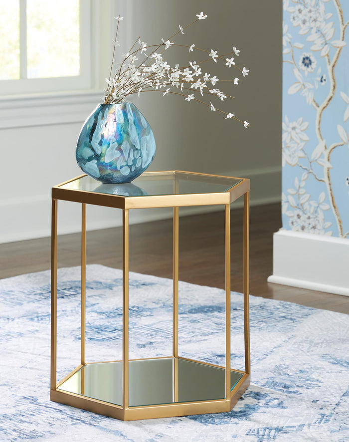 Hexagonal accent cocktail table with glass panels and gold metal frame