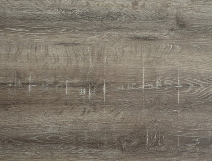 Gray wood tabletop close-up showing grain and light scuffs