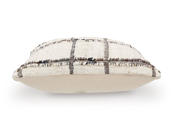 Plaid throw pillow with off-white base and dark grid lines, side view