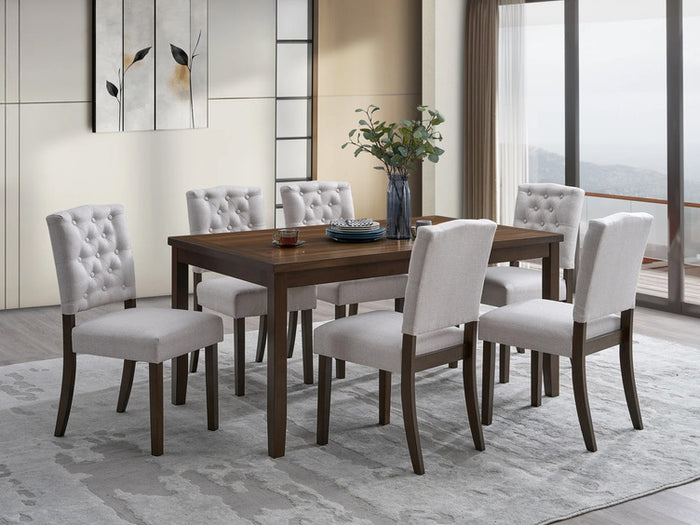 Tufted light-gray dining chair with buttoned back and upholstered seat, dark wood legs
