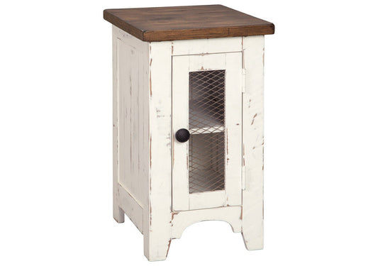 Chairside end table with dark brown top, white distressed body, mesh door and round knob